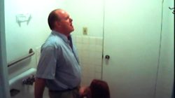 Bathroom slut sucks dick in restroom